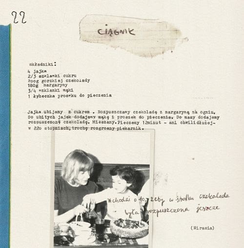 An old chocolate cake recipe page with handwritten notes and a black-and-white photograph of two people baking